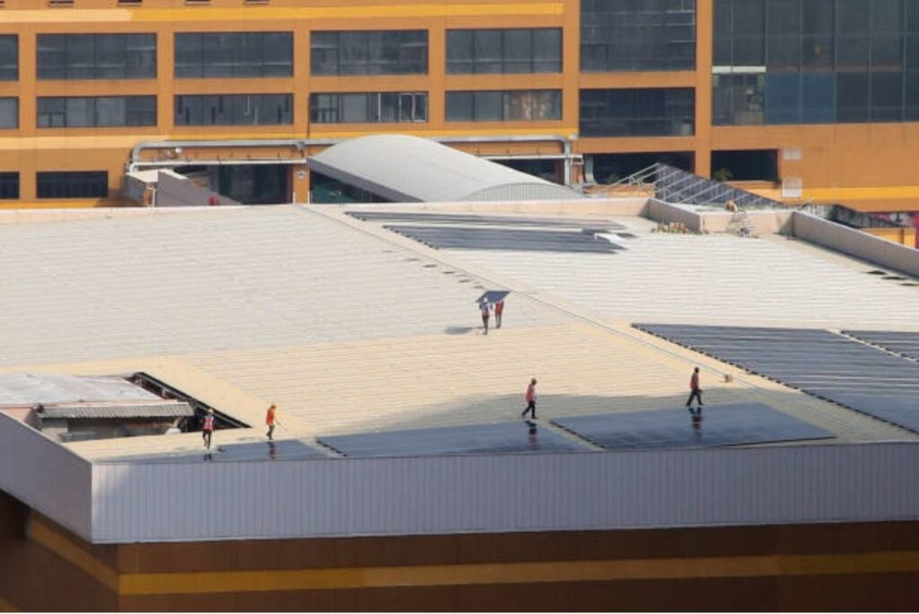 Working on completing a commercial roof