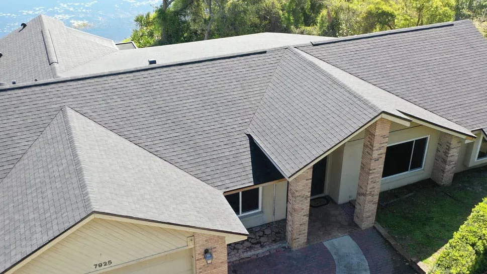 Aerial view of a finished shingle roof on a Central Florida home